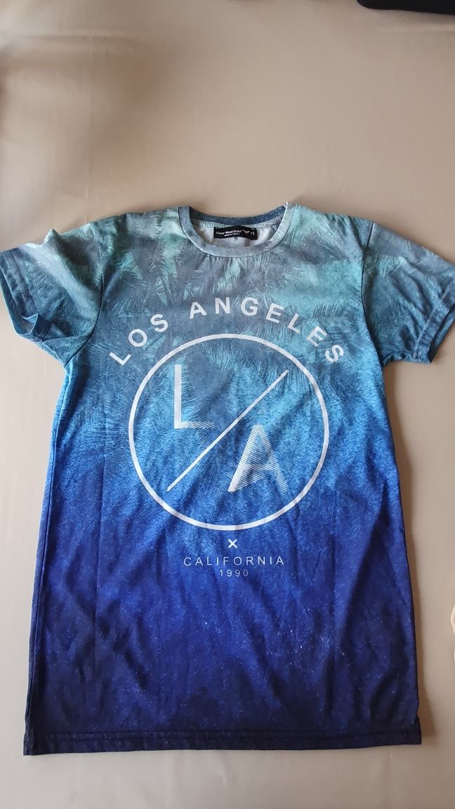 T-shirts  como novas
T 38/40
T
