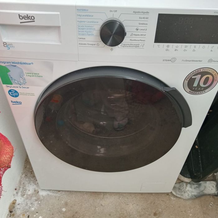 Maquina de lavar e secar nova com garantia de 3 anos