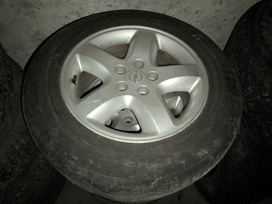 Комплект колес (4) диски opel 16 дюймів + резина 215/60/16
