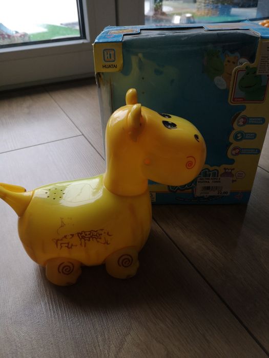 Jeżdżący hipopotam zabawka grająca do raczkowania