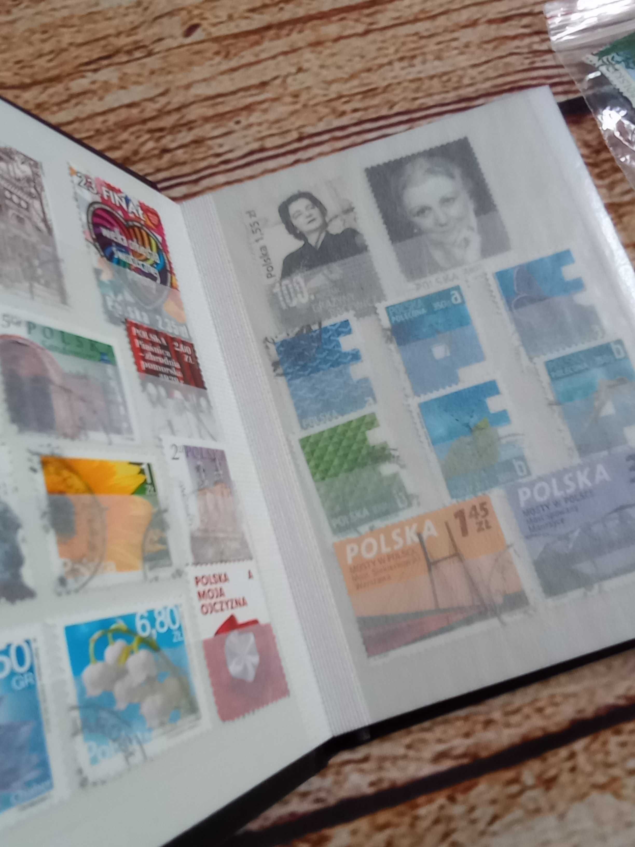 Album Leuchtturm - klaser na znaczki ze znaczkami. Komplet