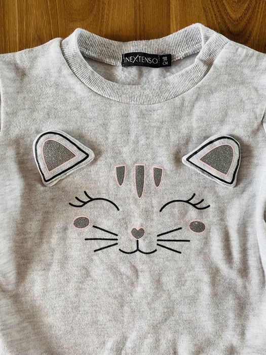 Bluza ciepła ocieplana kotek kropli błyszczące guziki przy dekolcie