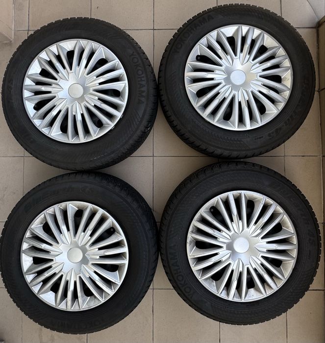 opony (caloroczne) 195/65 R15 jak nowe + felgi stalowe 15”+ Kołpaki