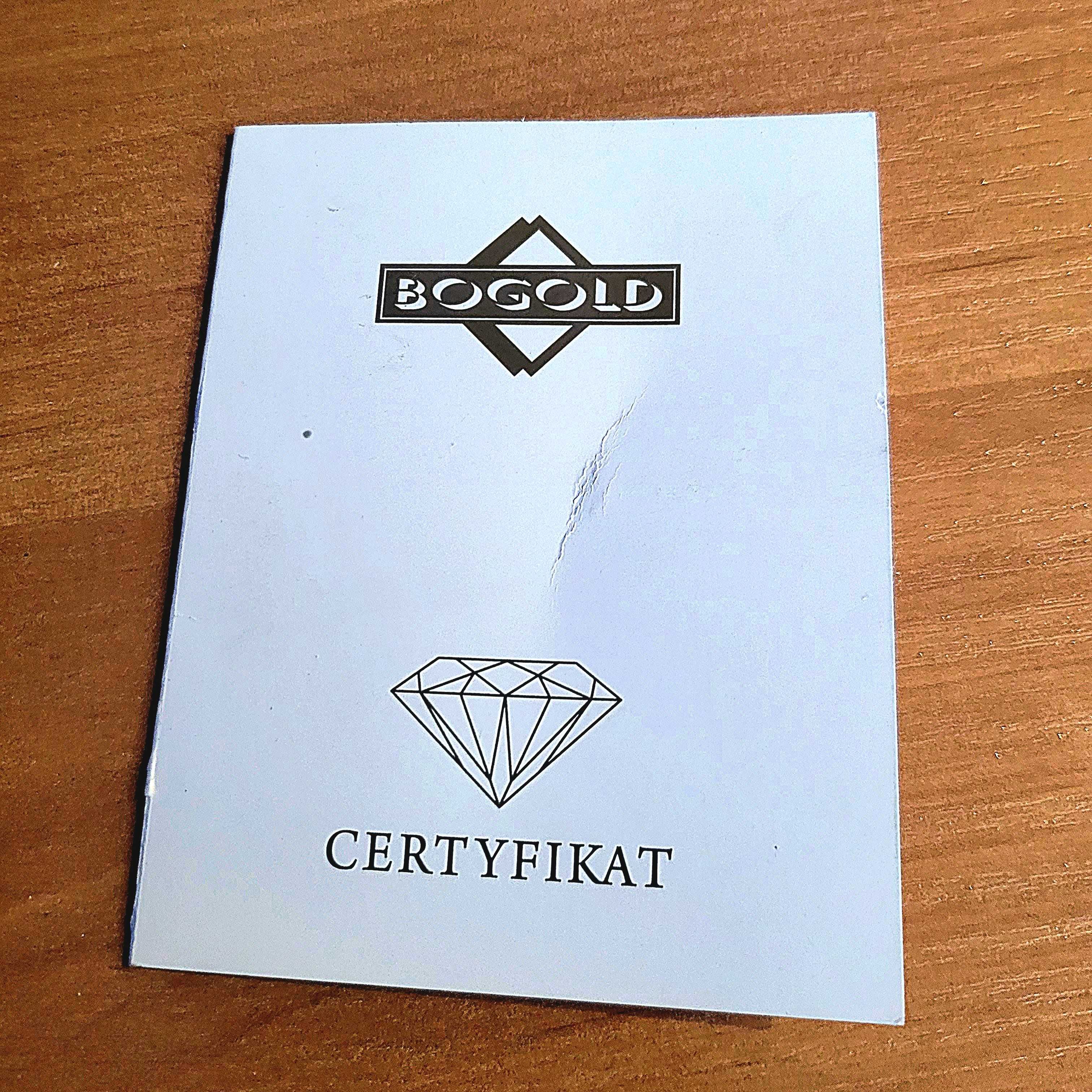 Złoty pierścionek z brylantem - certyfikat