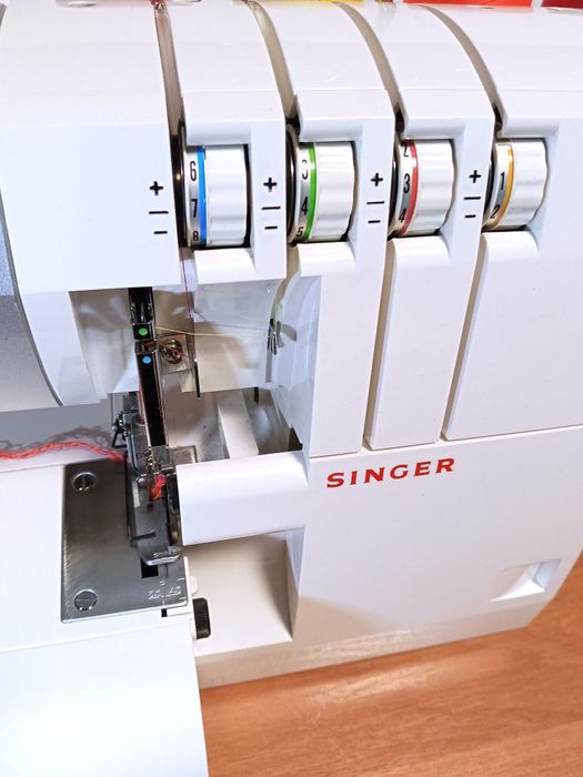 Оверлок Singer Легендарная фирма веников не вяжет