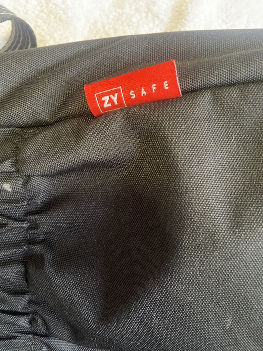 Baby diaper bag in black colour.