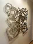 Escultura de parede abstracta em madeira