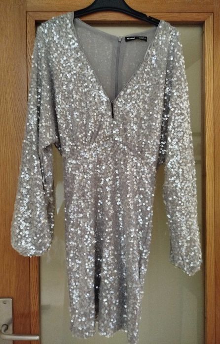 Vestido de lantejoulas prateada, como novo, usado apenas uma única vez