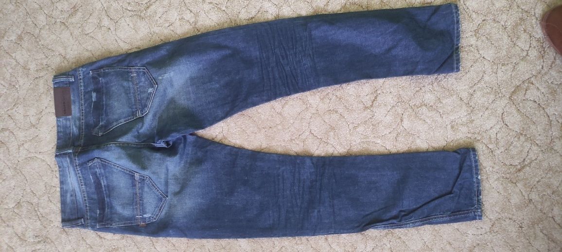 Spodnie męskie jeansowe Cropp z przetarciami 30/32