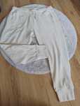 Kremowe spodnie dresowe na gumce plus size 7XL 54