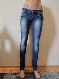 Новые джинсы женские