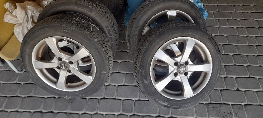 Alu-felgi 15 Opel  z oponami wielosezonowymi Corsa D Astra H G Meriva