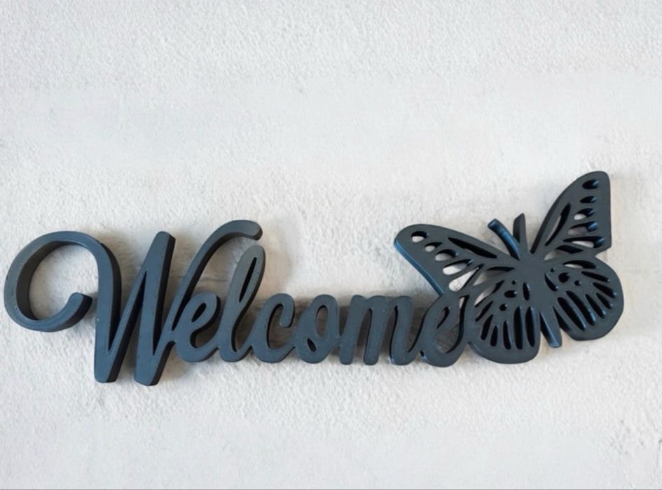 Letras Welcome com borboleta