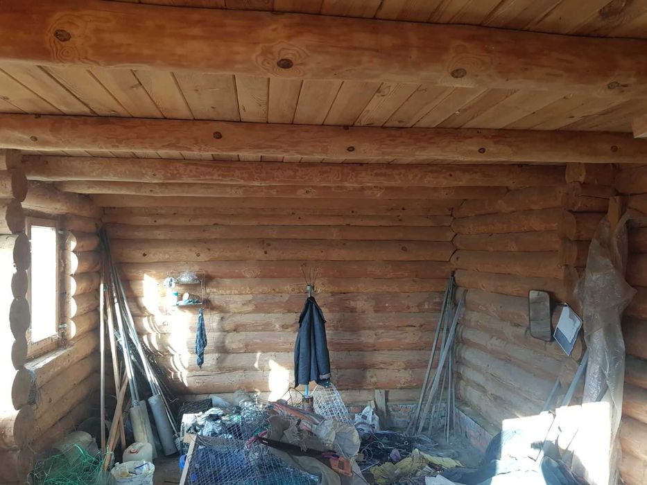 Будиночок зі зрубу та земельна ділянка 15 сот. с. Забужжя