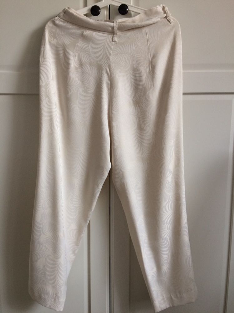 Letnie damskie spodnie h&m kremowe w kwiaty z wysokim stanem 38