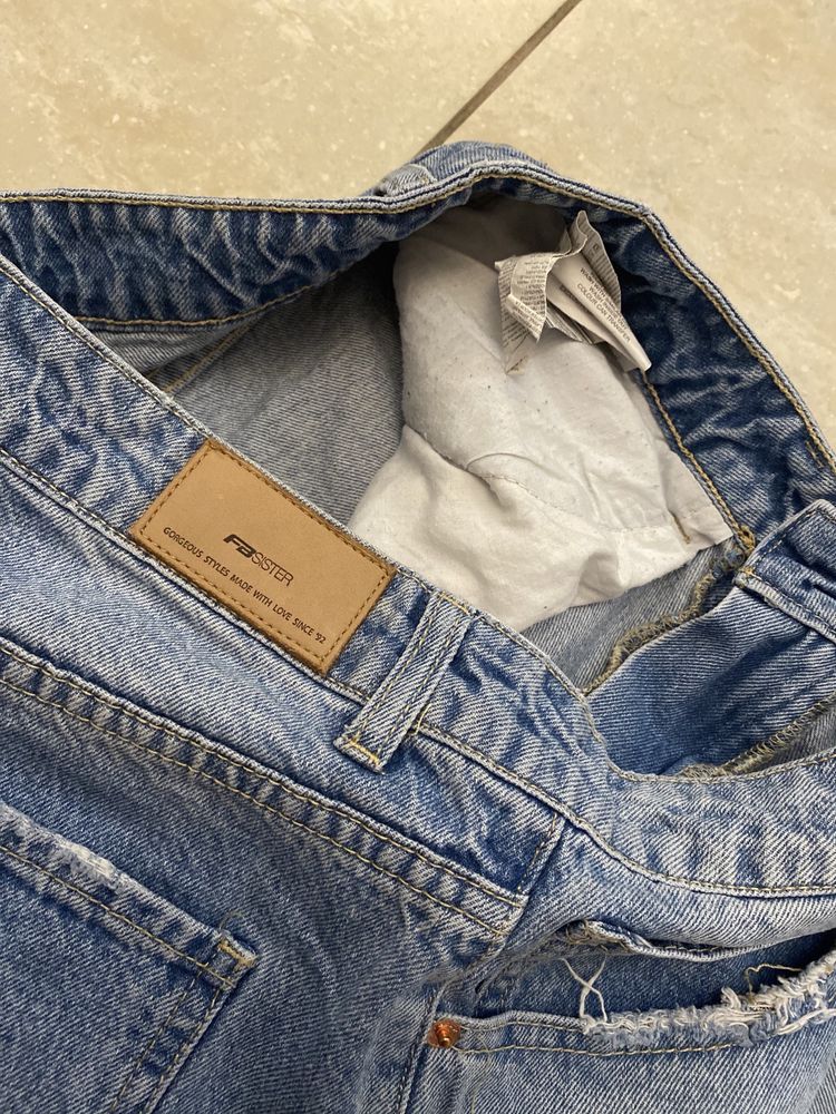 Damskie jeans, extra szerokie spodnie New Yorker  r. L/40 dziury