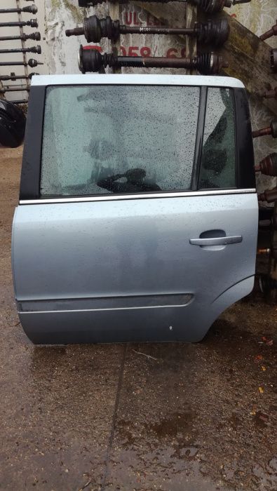 Drzwi opel Zafira B  tył lewe tył kod lakieru Z163