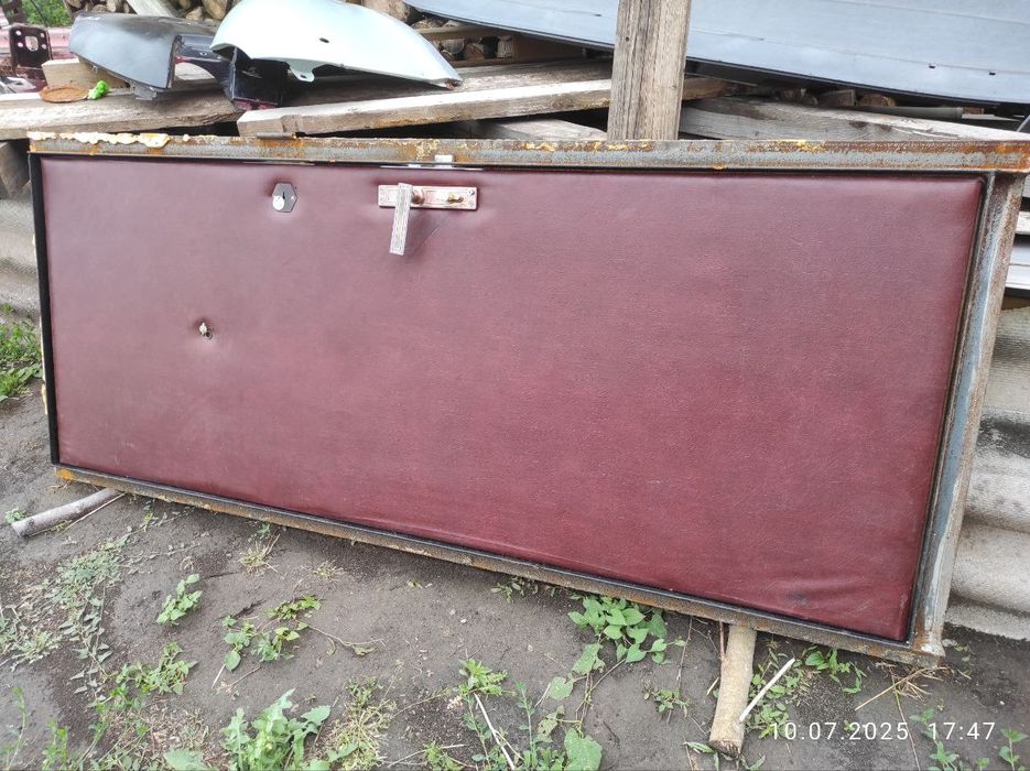 Двері металеві утеплені в погреб - гараж 2,04*0,85