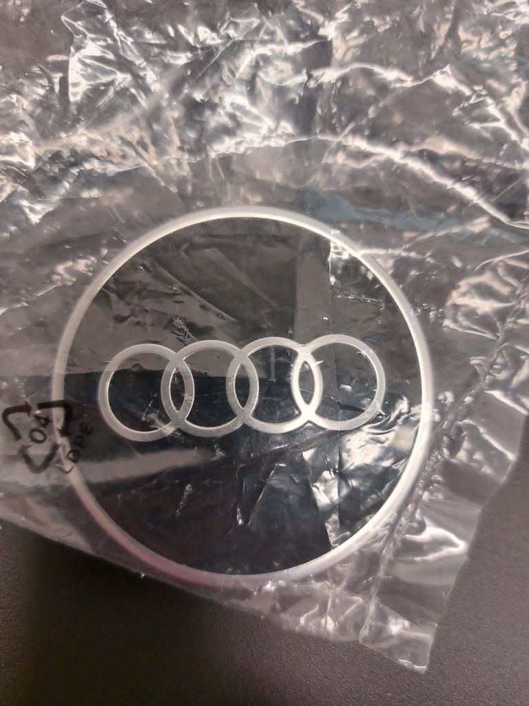 Nowe oryginalne dekielki/ zaślepki do Felg Audi 81A.601.170/komplet