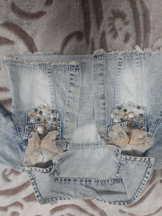 Джинсові куртки для дівчинки