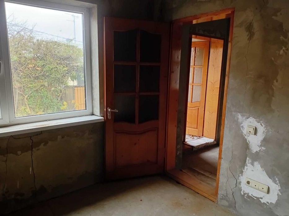 Продам 1/2 частину будинку із ділянкою , гаражем біля Турецького моста