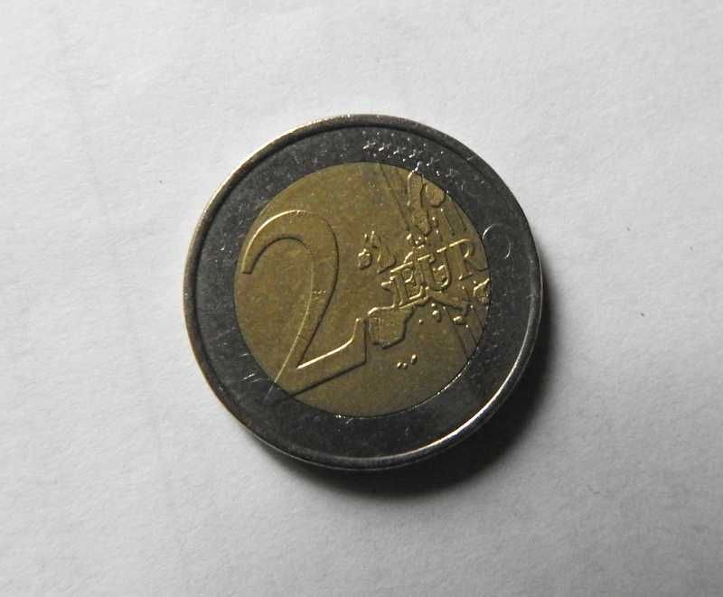 Dwie monety 2 euro z błędami.