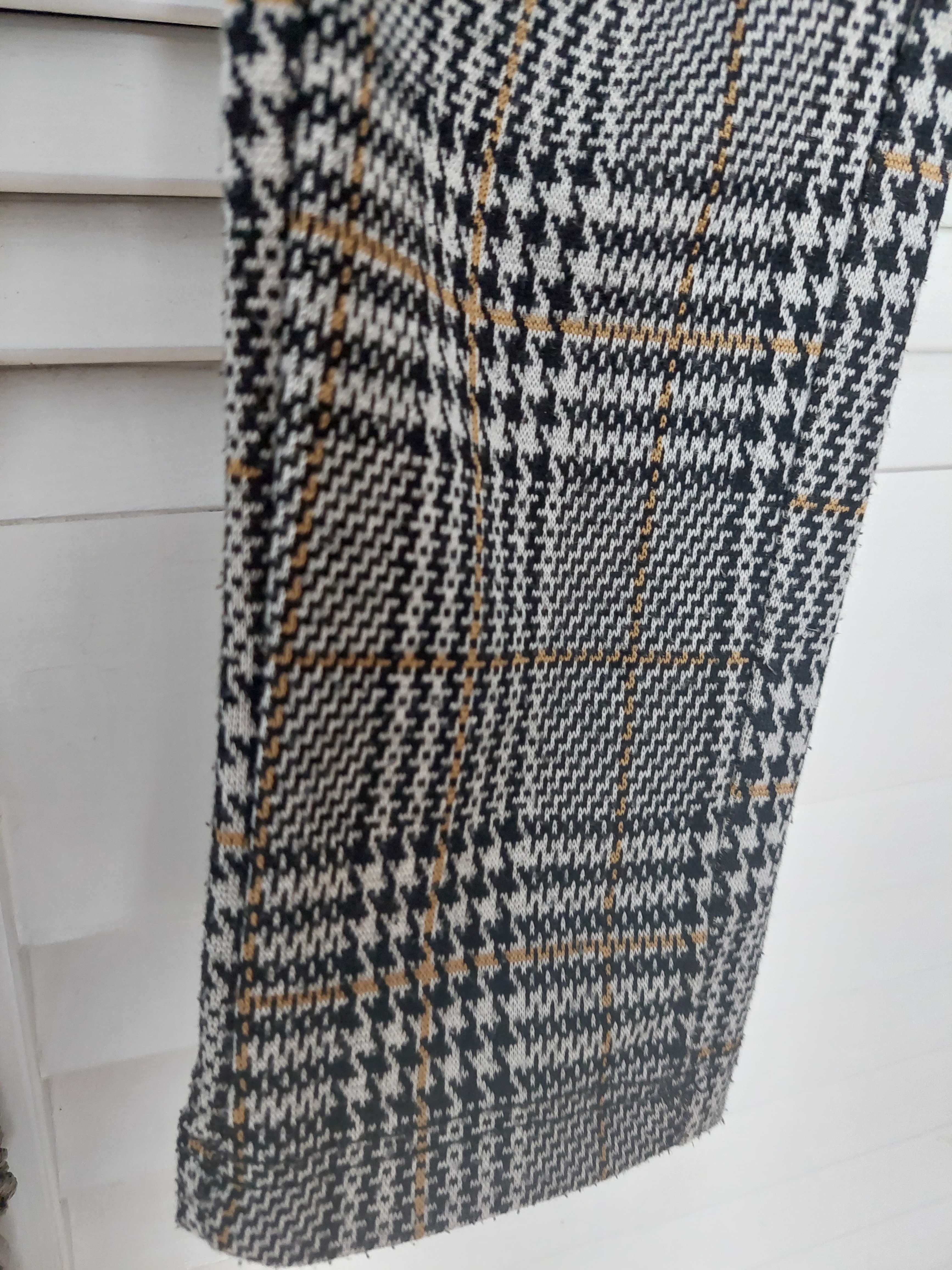 Reserved legginsy w kratke r.128