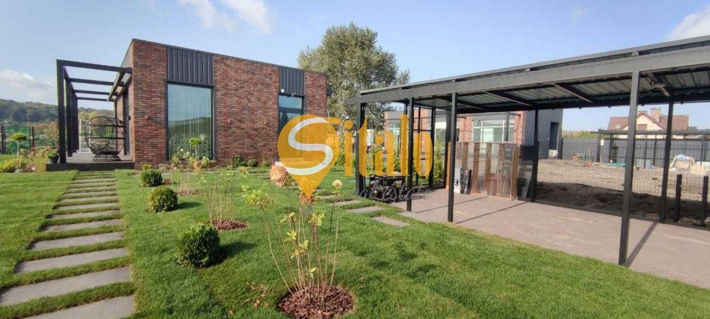 Новий будинок з ремонтом та каміном в Підгірцях,