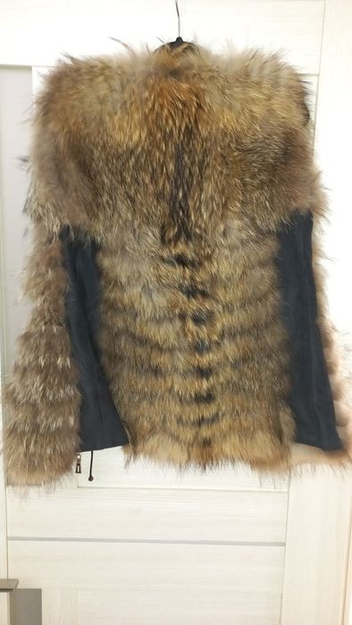 Меховая желетка енот