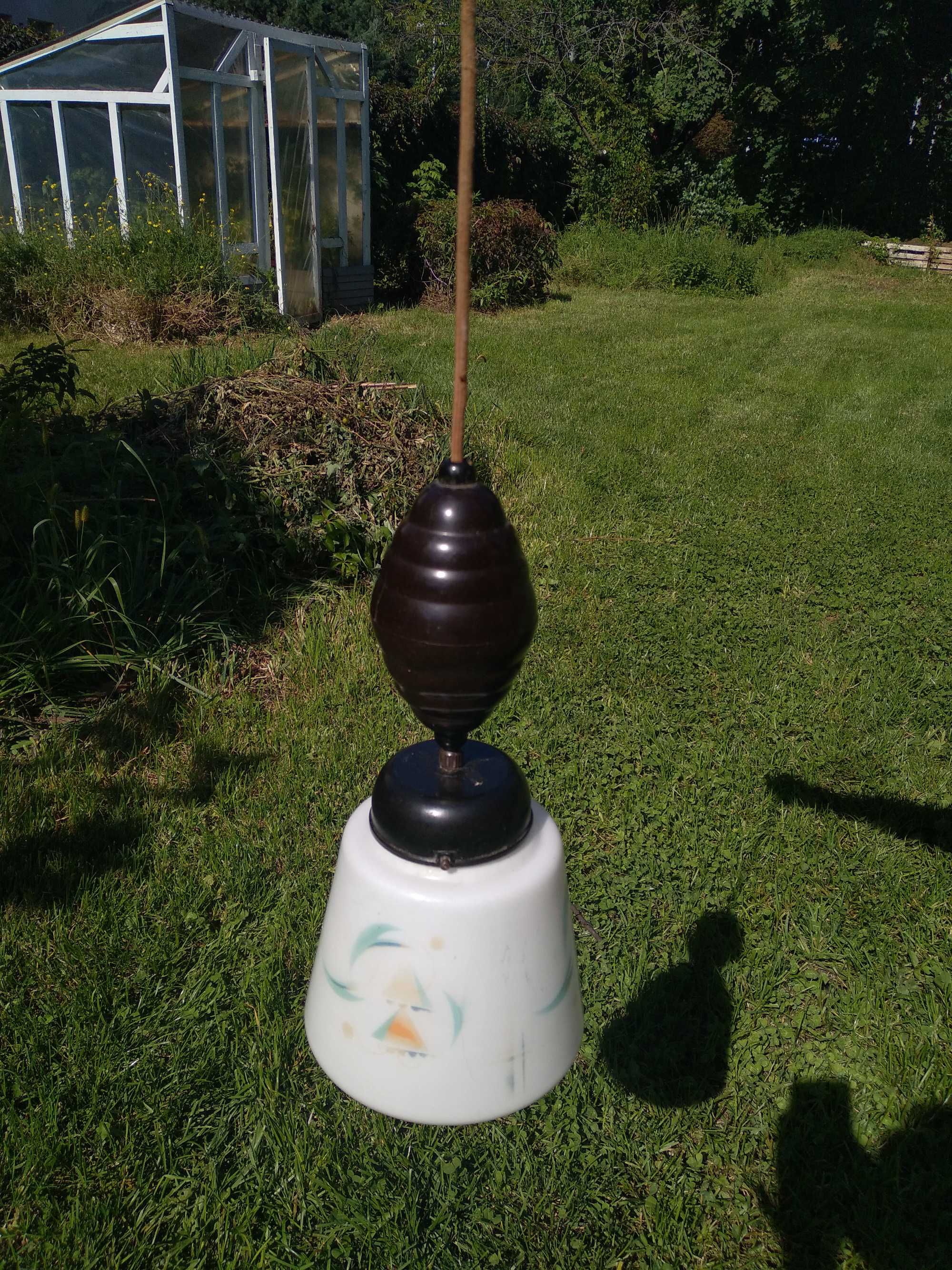 Stara regulowana lampa z odważnikiem