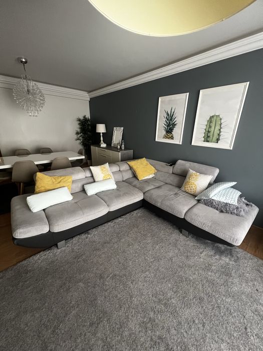 Sofa de canto cinzento