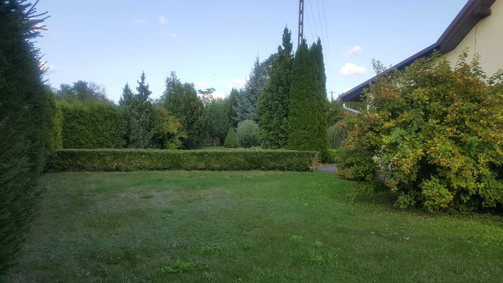 Sprzedam dom Mazurach + hala , 2 garaże.