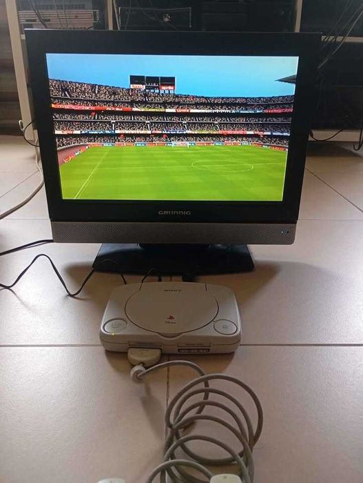 PsOne com comando oferta jogo