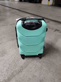 Nowa miętowa walizka podróżna