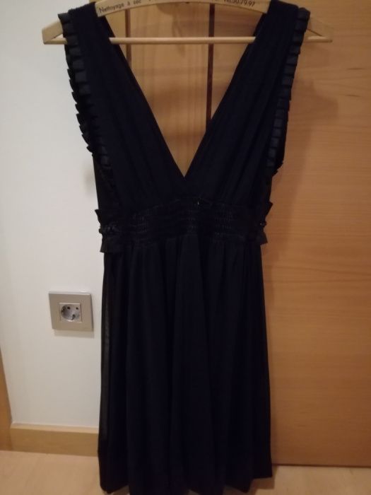 Vestido L, mas é um L pequeno.(para desocupar)