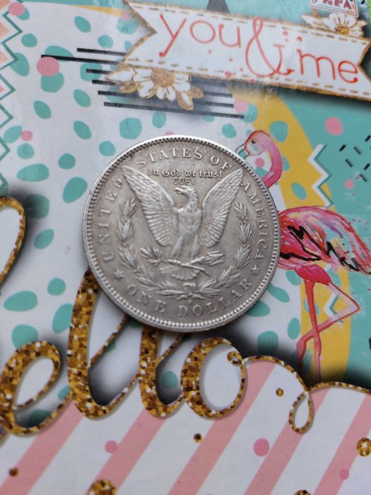 Старинная серебряная монета в 1 доллар