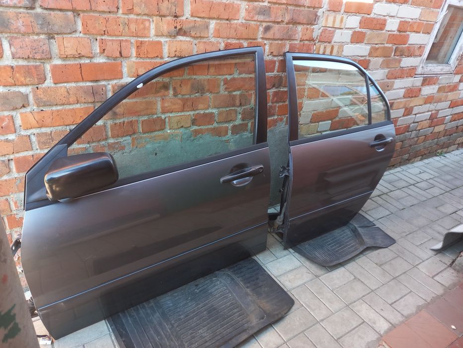 Двери митсубиси лансер 9