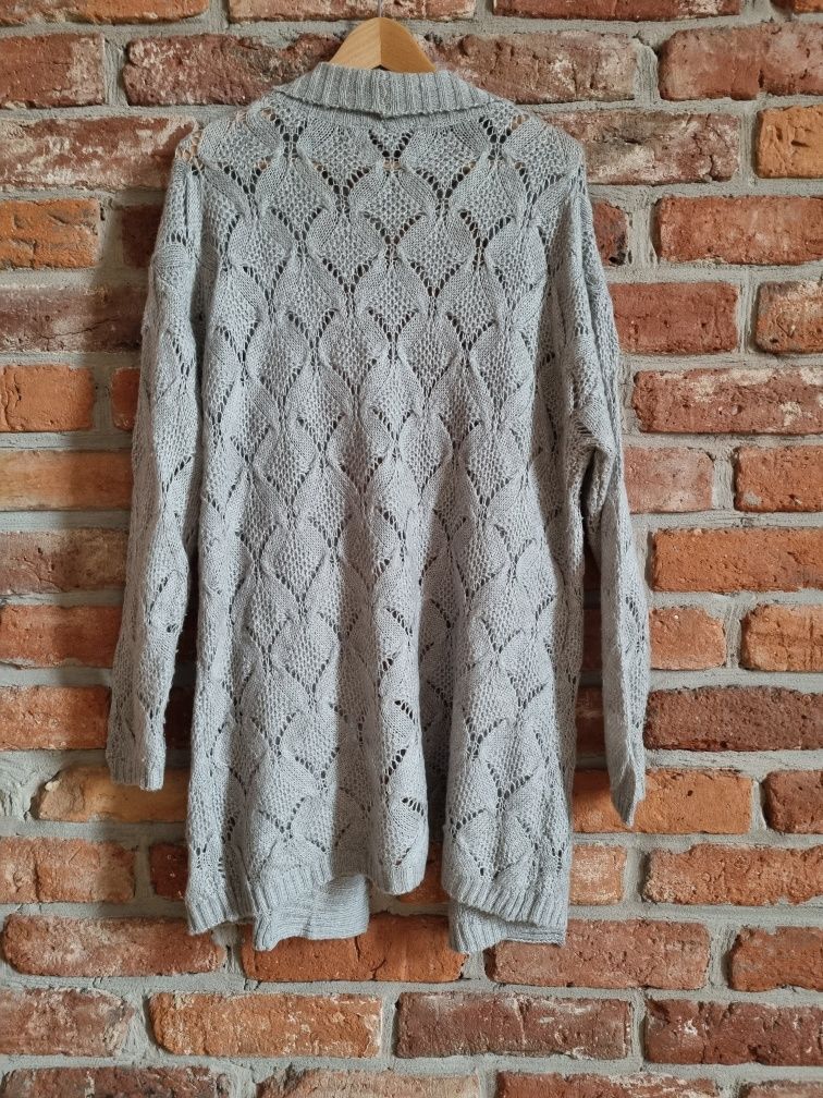 Miętowy ażurowy sweter