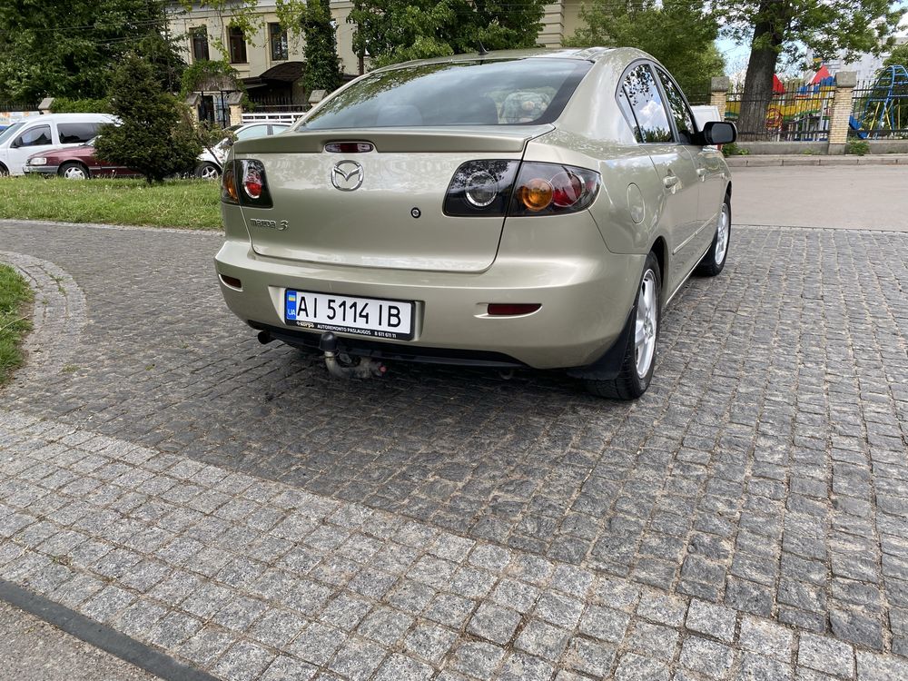 Мазда 3 , 2006