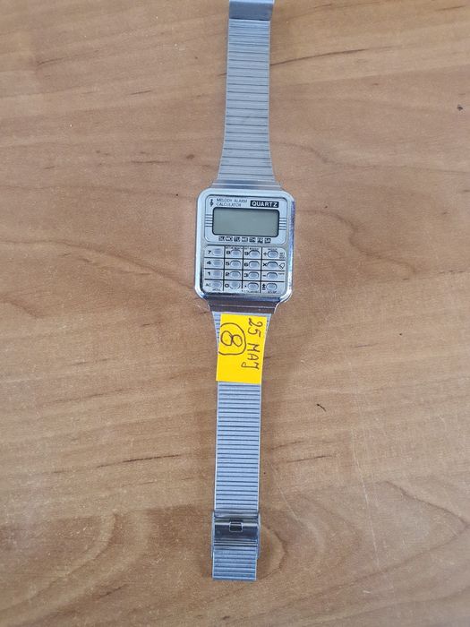 Zegarek męski z kalkulatorem.