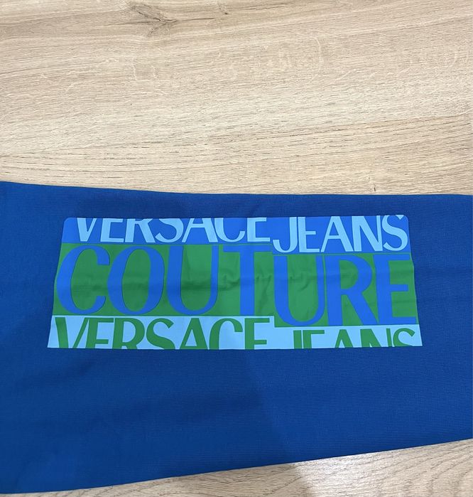 Spodnie Versace sportowe . Rozm M . Original