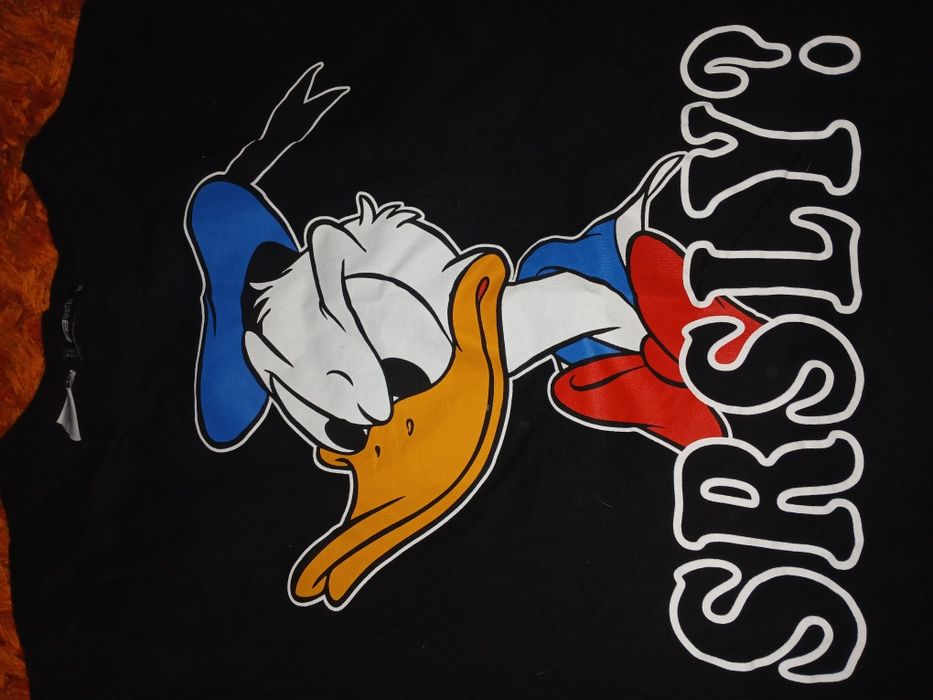 2 nowe koszulki Disney Simba i kaczor Donald młodzieżowe/damskie roz M