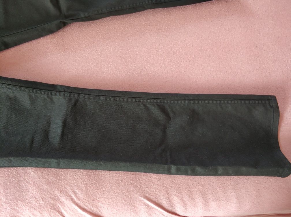 Lee woskowane spodnie czarne 30/33