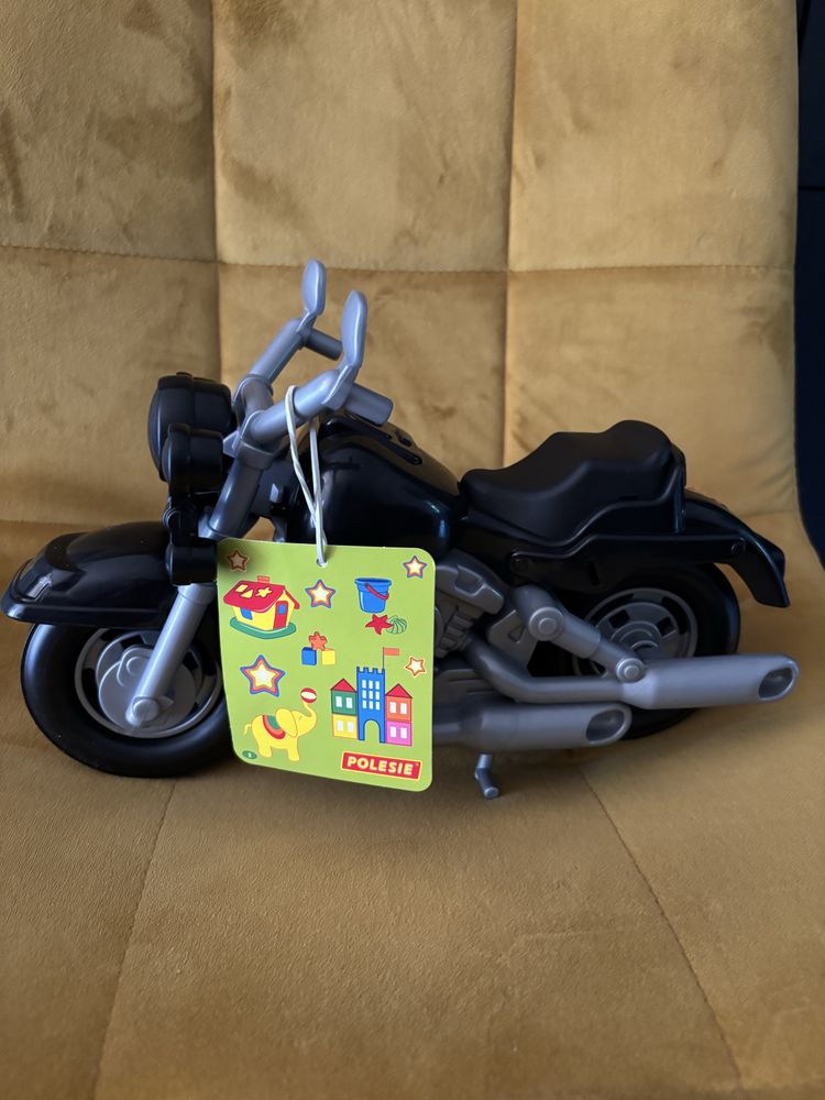 Plastikowy motor zabawka