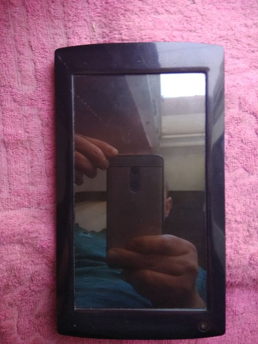 Планшет б/у,в хорошем состоянии без зарядки