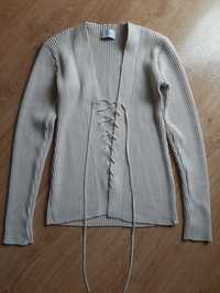 kremowy prążkowany sweterek z wiązaniem