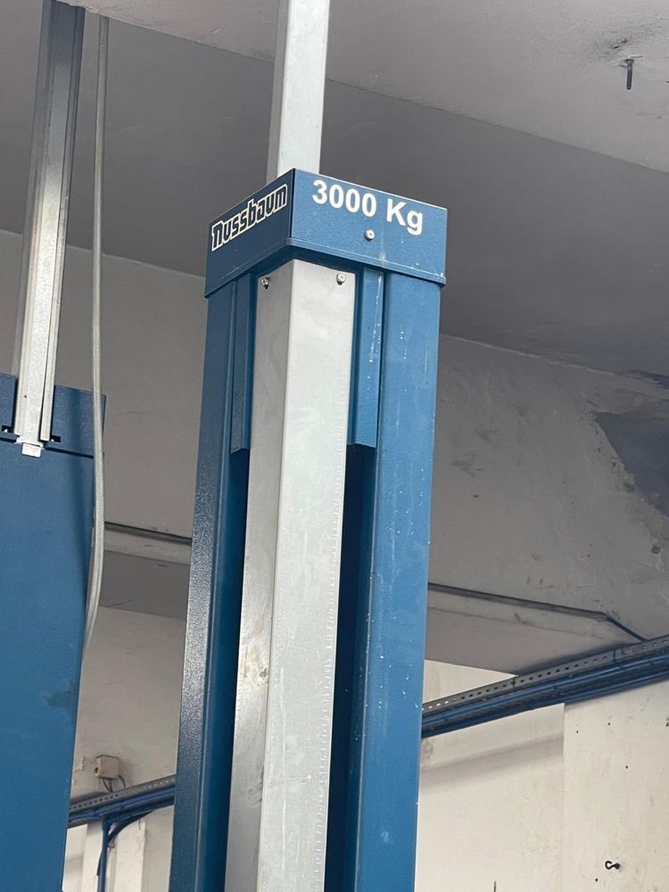 Elevador Nussbaum para oficina como novo