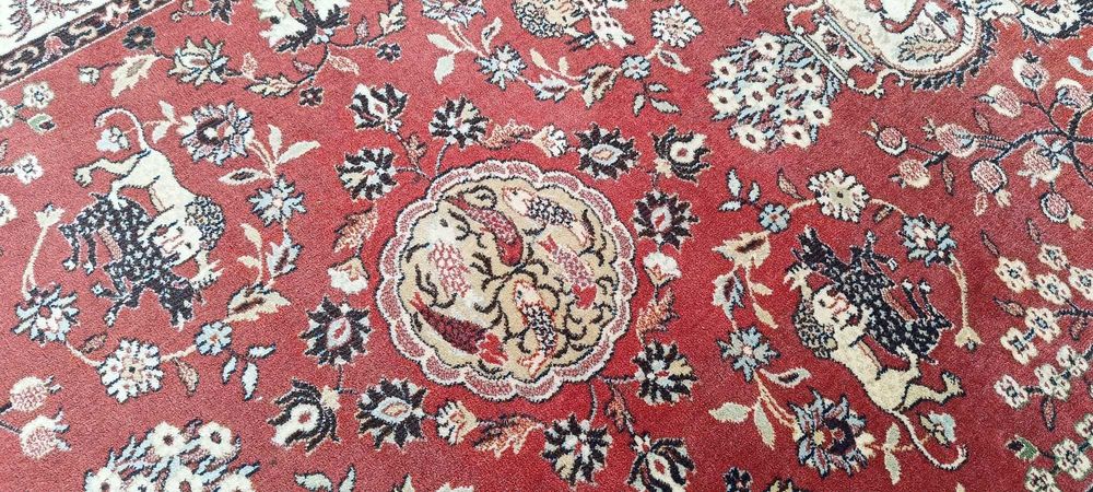 Perski dywan wełniany tkany ręcznie 215 x 132 cm wełna motyw zwierząt