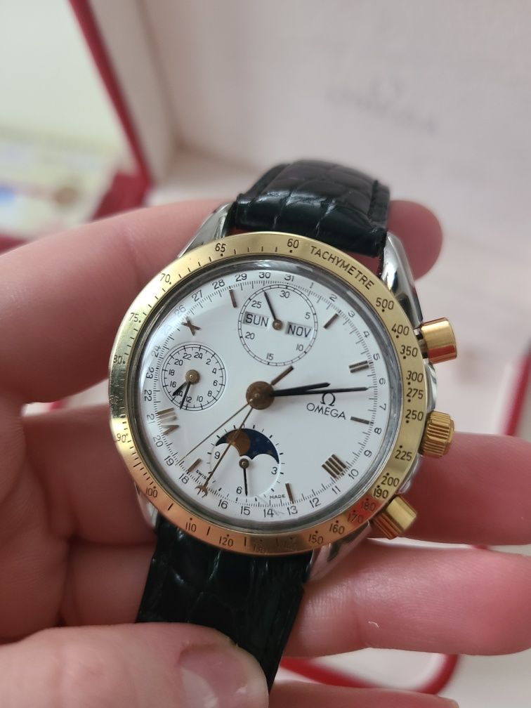 Часы Omega золотые