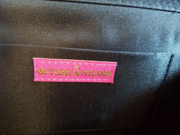 Torebka kopertówka renomowanej firmy Butler & Wilson
